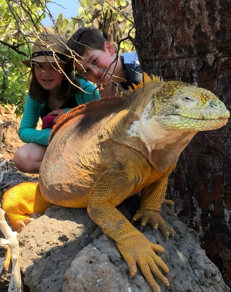Kids with a land iguana